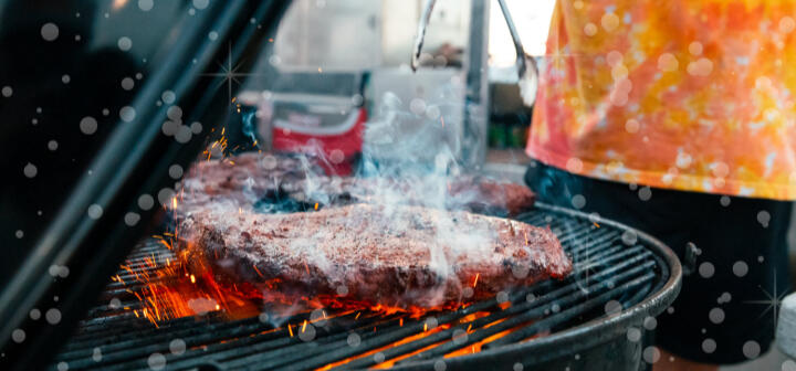 Brisket seared on a charcoal grill